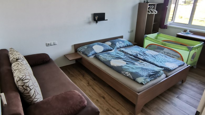 Triple room with extra bed, © Ferienwohnung Florine Triple room with extra bed, © Ferienwohnung Florine