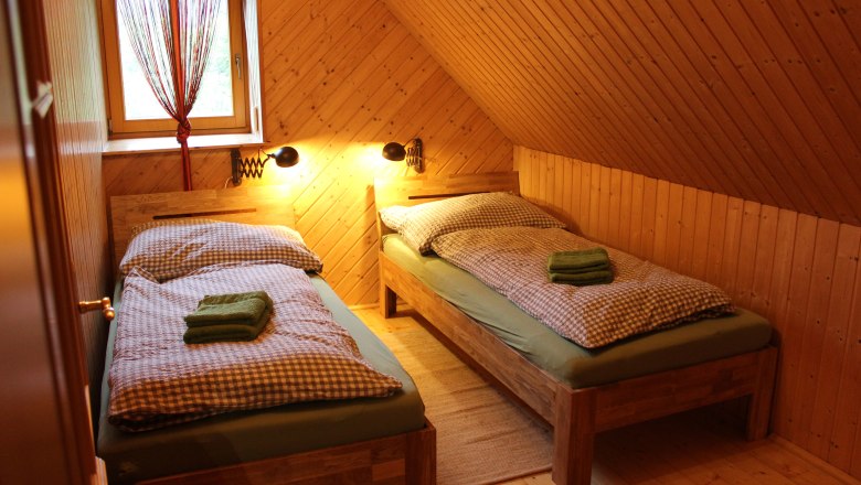 Schlafraum Einzel- oder Doppelbett, Ferienwohnung Jägerstube, © Marianne Schmid