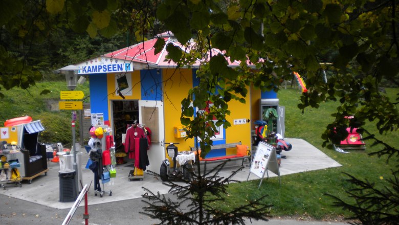 Kampsee region information center, © MG Rfd Small, colorful information center with outdoor toys and clothing.