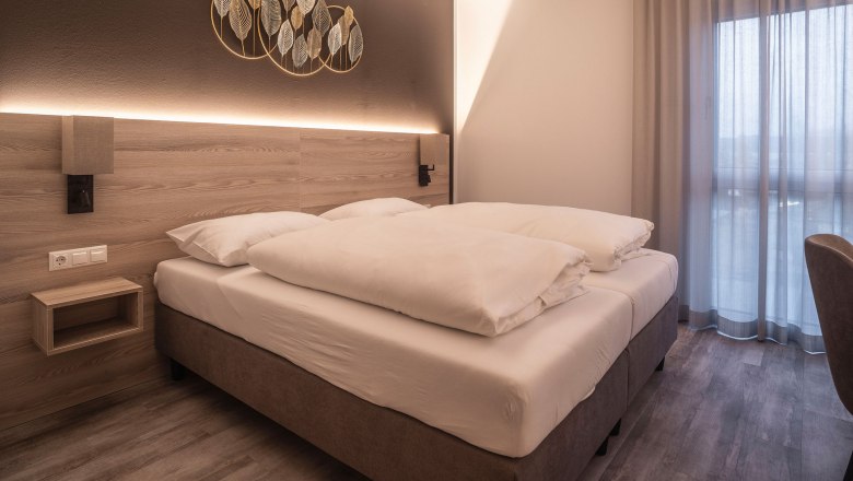 Schlafzimmer, © BAWU HotelbetriebsgmbH, Fotograf Petr Dobias
