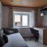 Büroecke und Smart TV mit SAT im Wohnzimmer, © Ferienhaus Leopold