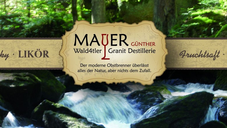 Werbebanner der Wald4tler Granit Destillerie mit Waldhintergrund.