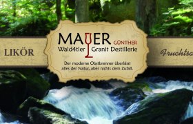 Werbebanner der Wald4tler Granit Destillerie mit Waldhintergrund.