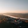 Aerial view of Maria Taferl with the Danube in the background at sunset.