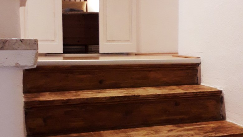 ...mit Blick in eines der Schlafzimmer, © U.E.